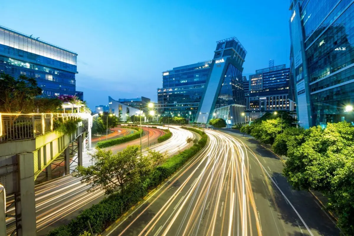 Modern India skyline at night with light trails